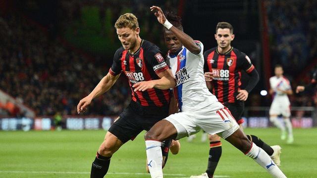 包含伯恩茅斯客场告捷，保级前景一片光明的词条